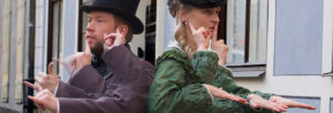 man och kvinna i 1900-talskostym som tecknar med fler än två händer var