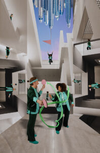 Två personer leker med band och bollar i en futuristisk miljö